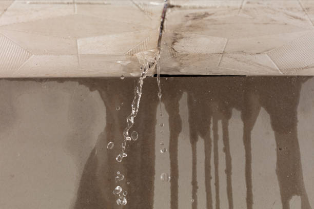 Professional Sewage Cleanup technician working in Manchester, MA